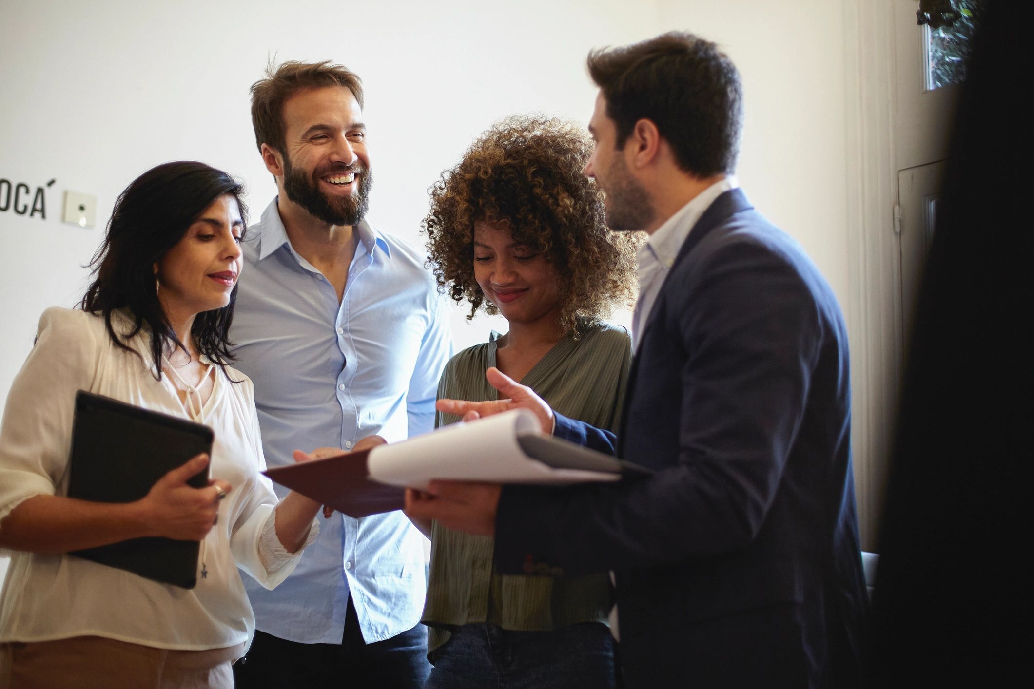Real estate professionals comparing identity report pricing